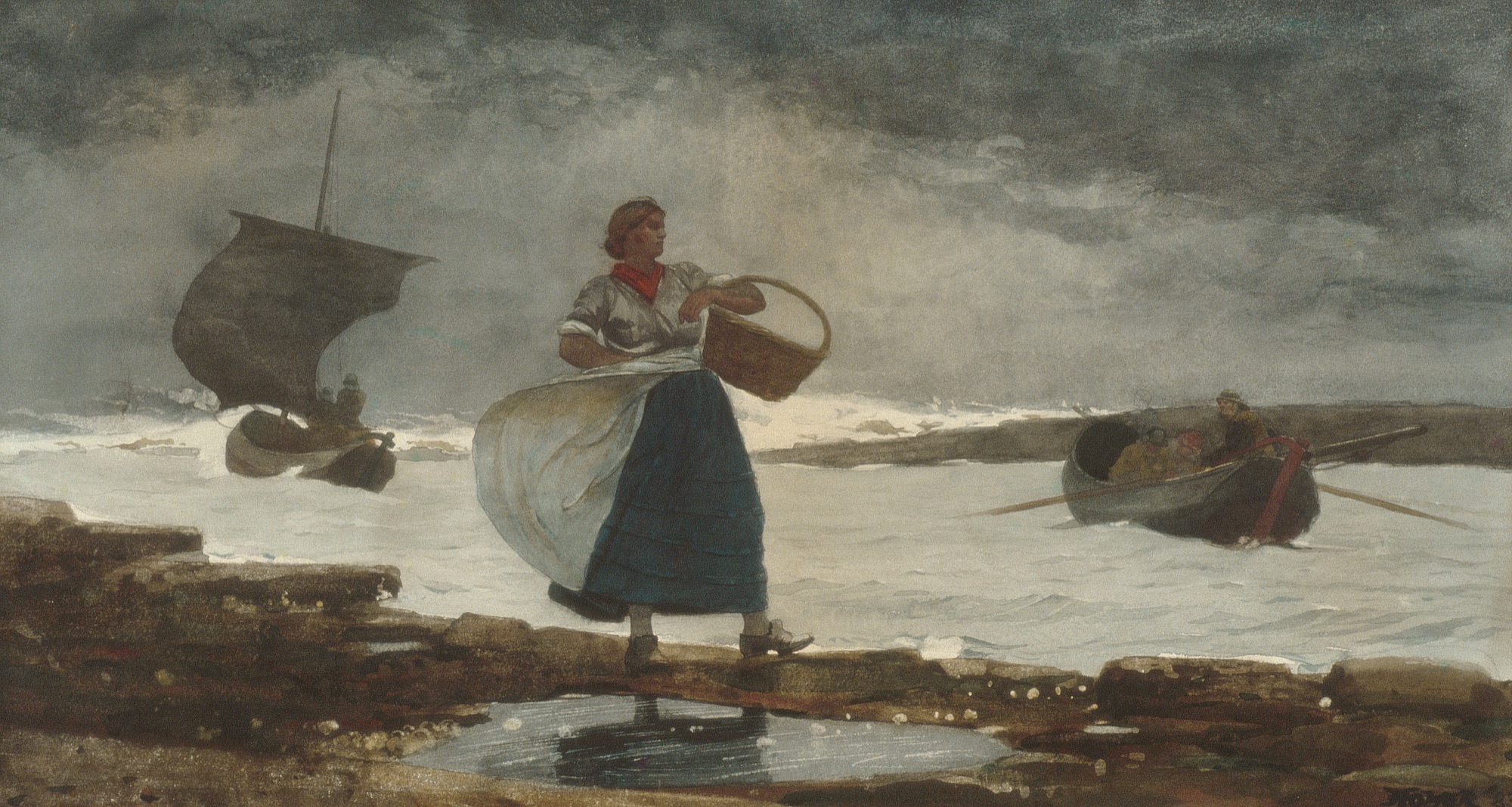 A woman in a deep teal skirt and red kerchief stands on a rocky shore with a basket, her white apron blown sideways, while dories work the surf under a storm-dark sky